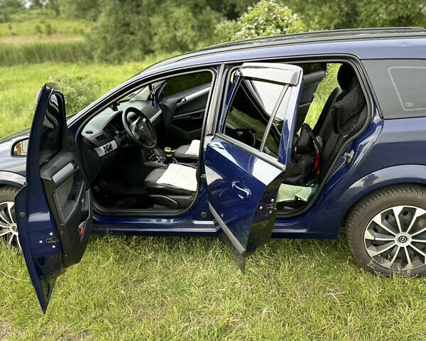 Синий Опель Астра, объемом двигателя 1.69 л и пробегом 330 тыс. км за 3900 $, фото 5 на Automoto.ua