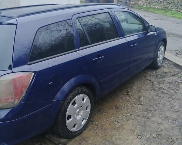 Синий Опель Астра, объемом двигателя 1.91 л и пробегом 297 тыс. км за 4200 $, фото 6 на Automoto.ua