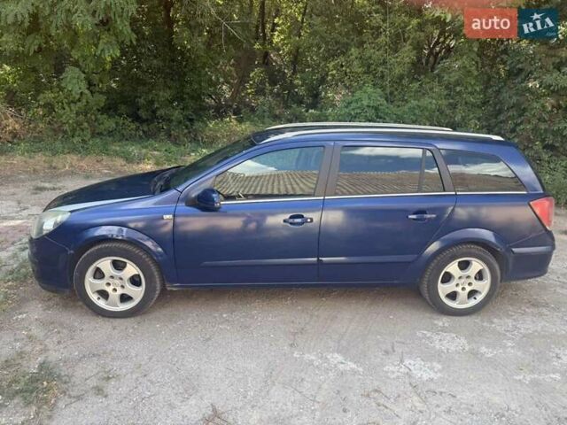 Синій Опель Астра, об'ємом двигуна 1.9 л та пробігом 330 тис. км за 3300 $, фото 5 на Automoto.ua