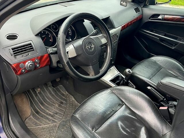 Синий Опель Астра, объемом двигателя 1.2 л и пробегом 328 тыс. км за 4000 $, фото 8 на Automoto.ua