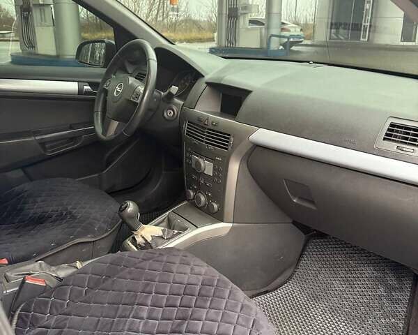 Синий Опель Астра, объемом двигателя 1.8 л и пробегом 273 тыс. км за 4590 $, фото 15 на Automoto.ua