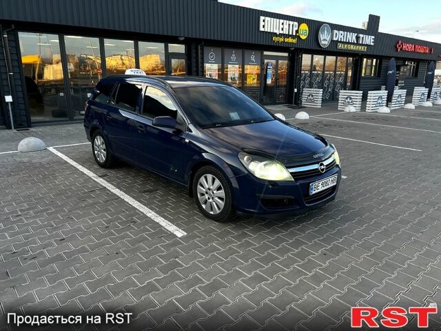 Синий Опель Астра, объемом двигателя 1.9 л и пробегом 320 тыс. км за 5000 $, фото 5 на Automoto.ua