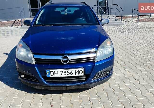 Синий Опель Астра, объемом двигателя 1.2 л и пробегом 328 тыс. км за 4600 $, фото 5 на Automoto.ua