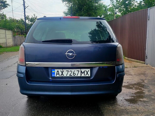 Синий Опель Астра, объемом двигателя 1.4 л и пробегом 375 тыс. км за 4100 $, фото 3 на Automoto.ua
