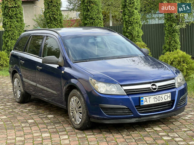 Синий Опель Астра, объемом двигателя 1.25 л и пробегом 399 тыс. км за 4300 $, фото 2 на Automoto.ua