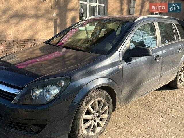 Синий Опель Астра, объемом двигателя 1.69 л и пробегом 204 тыс. км за 4300 $, фото 7 на Automoto.ua
