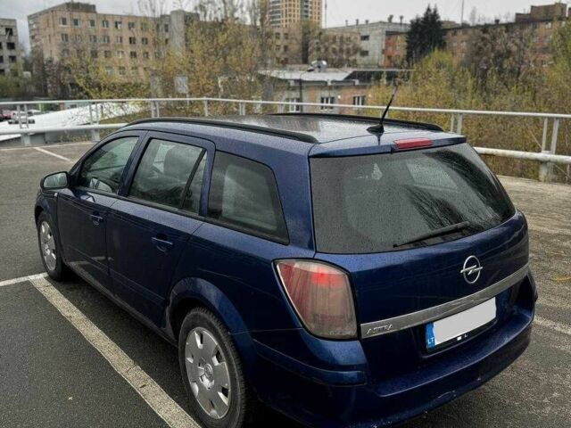 Синий Опель Астра, объемом двигателя 1.7 л и пробегом 266 тыс. км за 2199 $, фото 8 на Automoto.ua