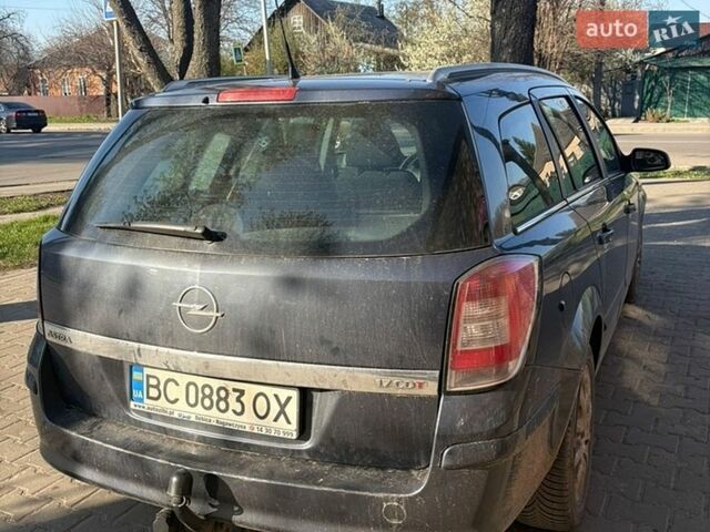 Синий Опель Астра, объемом двигателя 1.69 л и пробегом 204 тыс. км за 4300 $, фото 4 на Automoto.ua