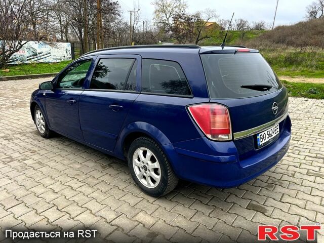 Синий Опель Астра, объемом двигателя 1.2 л и пробегом 328 тыс. км за 4000 $, фото 4 на Automoto.ua