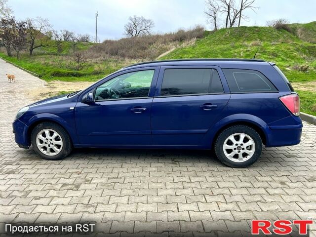 Синий Опель Астра, объемом двигателя 1.2 л и пробегом 328 тыс. км за 4000 $, фото 5 на Automoto.ua