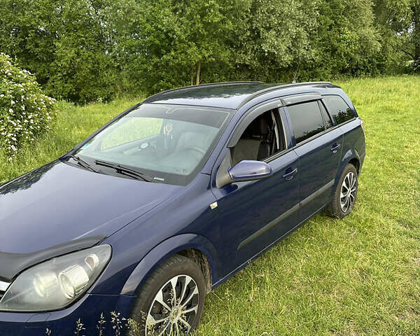 Синий Опель Астра, объемом двигателя 1.69 л и пробегом 330 тыс. км за 3900 $, фото 1 на Automoto.ua