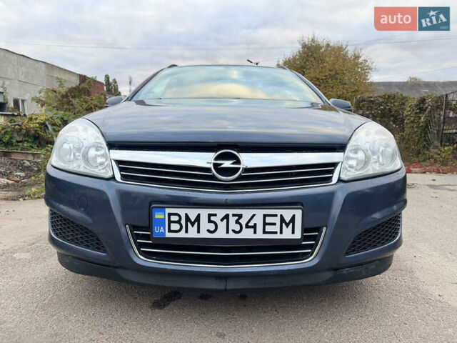 Синий Опель Астра, объемом двигателя 1.6 л и пробегом 260 тыс. км за 5750 $, фото 6 на Automoto.ua