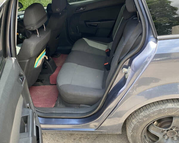 Синий Опель Астра, объемом двигателя 1.9 л и пробегом 300 тыс. км за 3800 $, фото 2 на Automoto.ua