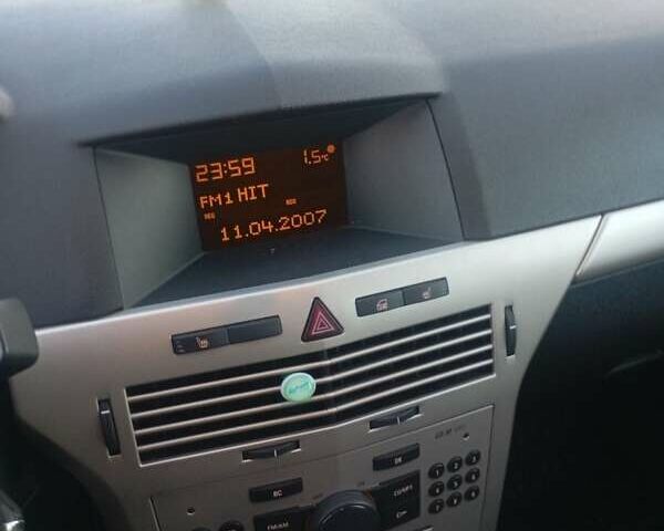 Синий Опель Астра, объемом двигателя 1.25 л и пробегом 208 тыс. км за 4650 $, фото 11 на Automoto.ua