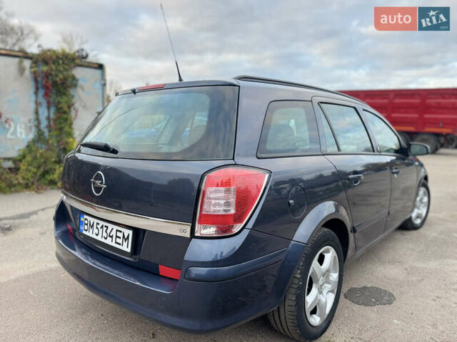 Синий Опель Астра, объемом двигателя 1.6 л и пробегом 260 тыс. км за 5750 $, фото 1 на Automoto.ua