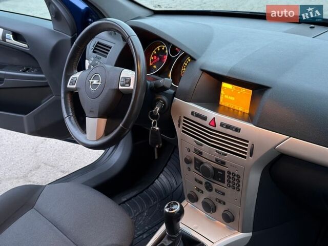 Синий Опель Астра, объемом двигателя 1.8 л и пробегом 203 тыс. км за 5200 $, фото 53 на Automoto.ua