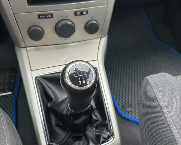 Синій Опель Астра, об'ємом двигуна 1.69 л та пробігом 274 тис. км за 5900 $, фото 19 на Automoto.ua