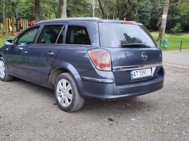 Синий Опель Астра, объемом двигателя 1.9 л и пробегом 303 тыс. км за 4950 $, фото 1 на Automoto.ua