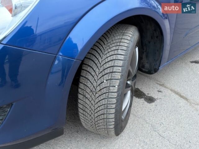 Синий Опель Астра, объемом двигателя 1.8 л и пробегом 203 тыс. км за 5200 $, фото 27 на Automoto.ua