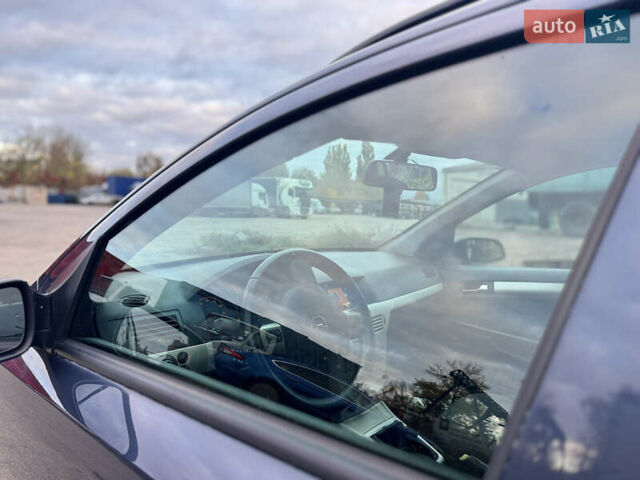 Синий Опель Астра, объемом двигателя 1.6 л и пробегом 260 тыс. км за 5750 $, фото 18 на Automoto.ua