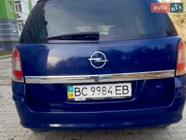 Синий Опель Астра, объемом двигателя 1.25 л и пробегом 298 тыс. км за 5100 $, фото 5 на Automoto.ua