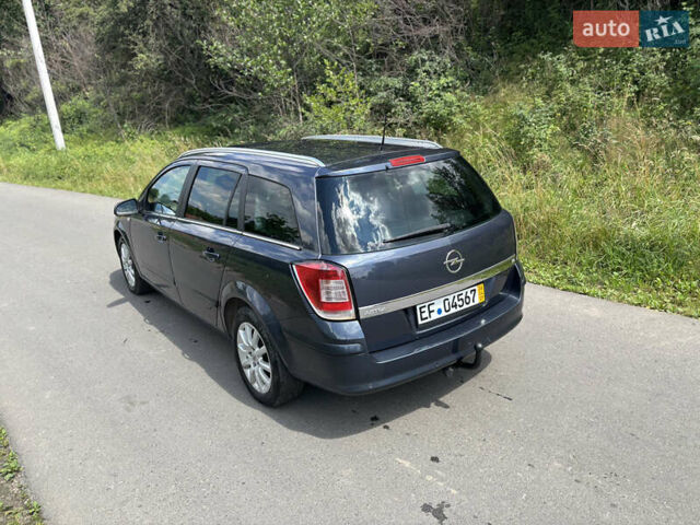 Синий Опель Астра, объемом двигателя 1.8 л и пробегом 260 тыс. км за 5550 $, фото 10 на Automoto.ua