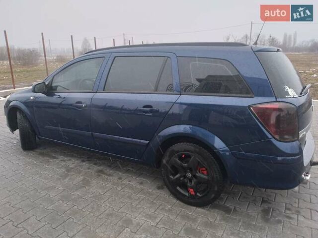 Синий Опель Астра, объемом двигателя 1.6 л и пробегом 248 тыс. км за 5100 $, фото 4 на Automoto.ua