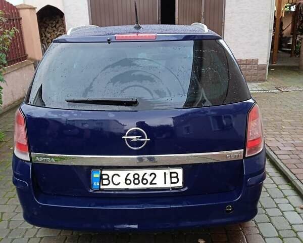 Синій Опель Астра, об'ємом двигуна 1.3 л та пробігом 237 тис. км за 5500 $, фото 1 на Automoto.ua