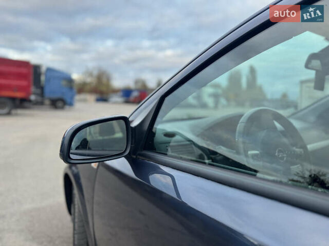 Синий Опель Астра, объемом двигателя 1.6 л и пробегом 260 тыс. км за 5750 $, фото 19 на Automoto.ua