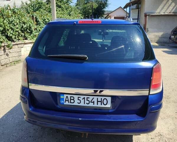 Синий Опель Астра, объемом двигателя 1.9 л и пробегом 190 тыс. км за 6000 $, фото 20 на Automoto.ua