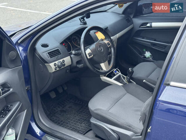 Синий Опель Астра, объемом двигателя 1.6 л и пробегом 304 тыс. км за 5400 $, фото 56 на Automoto.ua