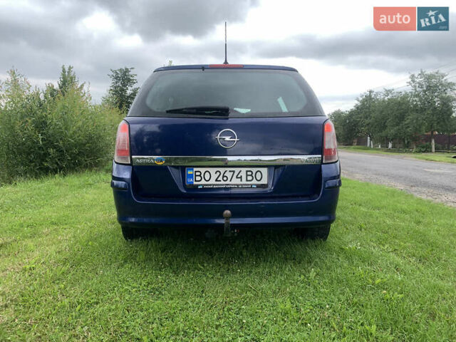 Синий Опель Астра, объемом двигателя 1.69 л и пробегом 320 тыс. км за 5000 $, фото 7 на Automoto.ua