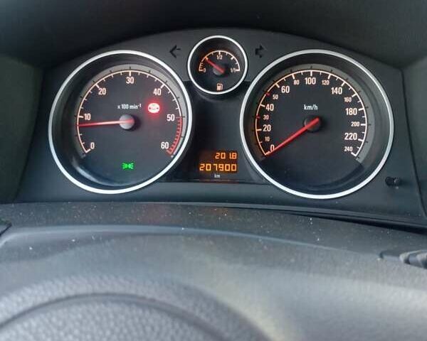 Синий Опель Астра, объемом двигателя 1.25 л и пробегом 208 тыс. км за 4650 $, фото 10 на Automoto.ua