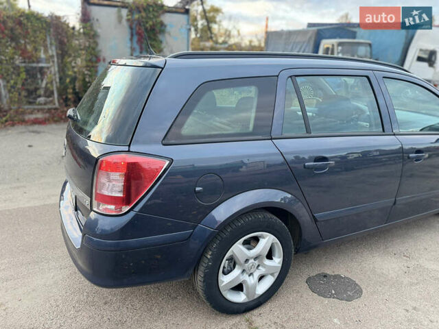 Синий Опель Астра, объемом двигателя 1.6 л и пробегом 260 тыс. км за 5750 $, фото 37 на Automoto.ua