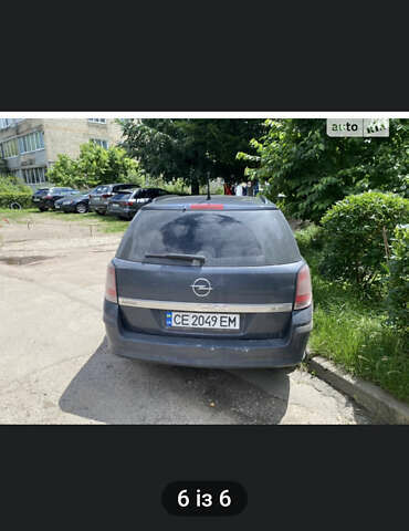 Синий Опель Астра, объемом двигателя 1.9 л и пробегом 300 тыс. км за 3800 $, фото 3 на Automoto.ua