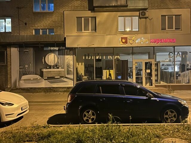 Синий Опель Астра, объемом двигателя 1.2 л и пробегом 281 тыс. км за 3900 $, фото 2 на Automoto.ua