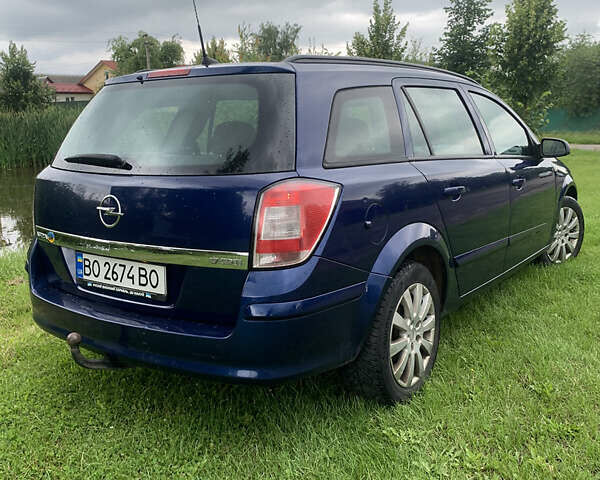 Синий Опель Астра, объемом двигателя 1.69 л и пробегом 320 тыс. км за 5000 $, фото 6 на Automoto.ua