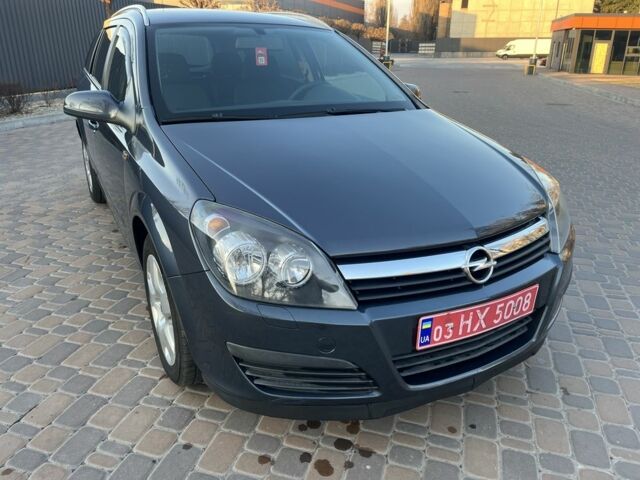 Синий Опель Астра, объемом двигателя 1.6 л и пробегом 265 тыс. км за 5600 $, фото 7 на Automoto.ua