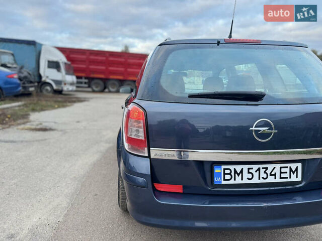 Синий Опель Астра, объемом двигателя 1.6 л и пробегом 260 тыс. км за 5750 $, фото 29 на Automoto.ua