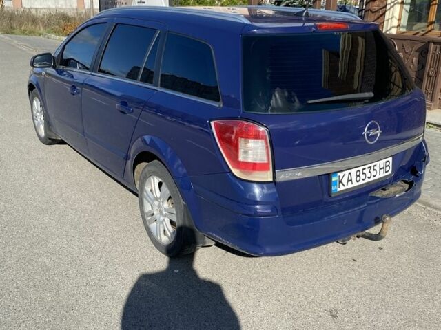 Синий Опель Астра, объемом двигателя 1.6 л и пробегом 295 тыс. км за 4099 $, фото 3 на Automoto.ua