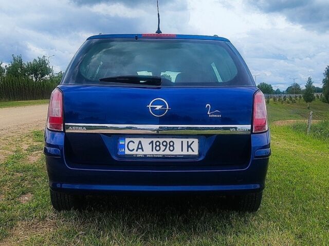 Синий Опель Астра, объемом двигателя 1.9 л и пробегом 265 тыс. км за 4600 $, фото 4 на Automoto.ua