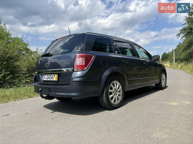 Синий Опель Астра, объемом двигателя 1.8 л и пробегом 260 тыс. км за 5550 $, фото 7 на Automoto.ua