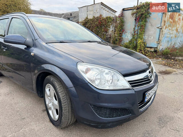 Синий Опель Астра, объемом двигателя 1.6 л и пробегом 260 тыс. км за 5750 $, фото 5 на Automoto.ua