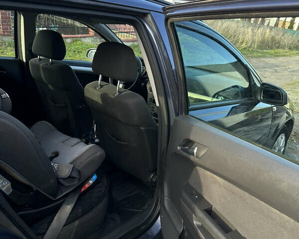 Синий Опель Астра, объемом двигателя 1.9 л и пробегом 260 тыс. км за 5700 $, фото 13 на Automoto.ua