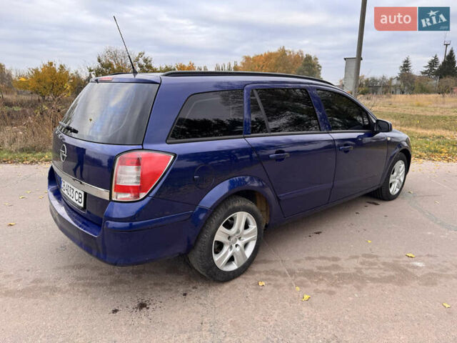 Синий Опель Астра, объемом двигателя 1.69 л и пробегом 354 тыс. км за 5200 $, фото 6 на Automoto.ua