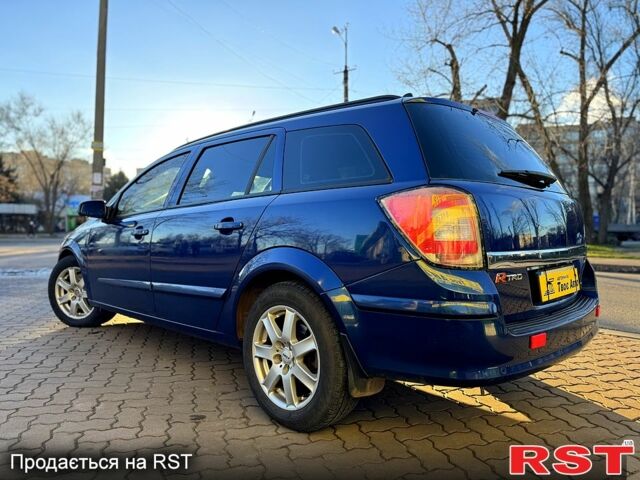 Синий Опель Астра, объемом двигателя 1.7 л и пробегом 318 тыс. км за 5350 $, фото 2 на Automoto.ua