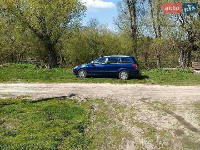 Синий Опель Астра, объемом двигателя 1.69 л и пробегом 285 тыс. км за 5300 $, фото 15 на Automoto.ua
