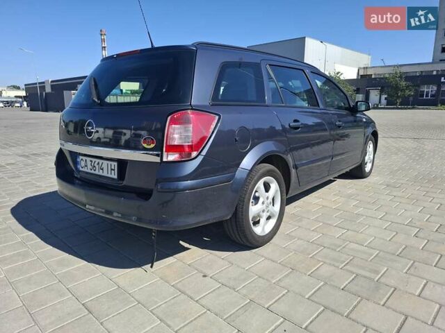 Синий Опель Астра, объемом двигателя 1.6 л и пробегом 194 тыс. км за 6250 $, фото 4 на Automoto.ua