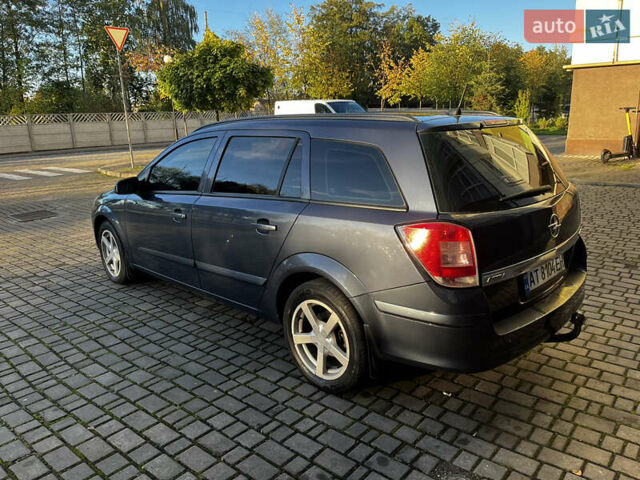 Синий Опель Астра, объемом двигателя 1.7 л и пробегом 243 тыс. км за 5600 $, фото 2 на Automoto.ua