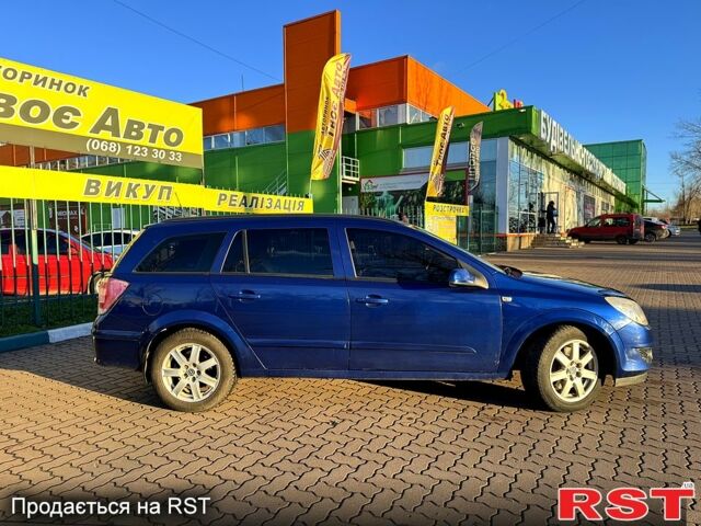 Синий Опель Астра, объемом двигателя 1.7 л и пробегом 318 тыс. км за 5350 $, фото 3 на Automoto.ua